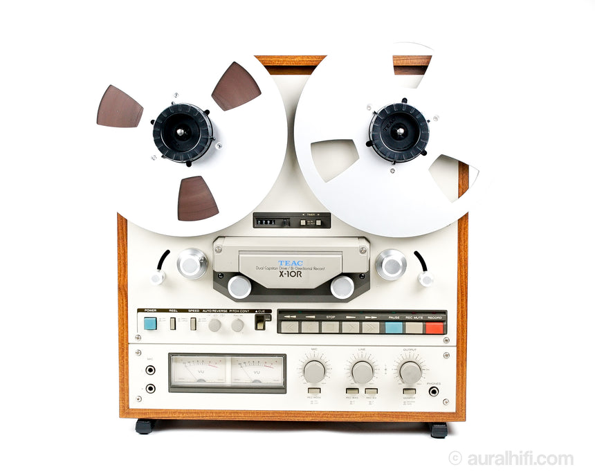 Vintage tape recorder with sound reels spinning, Technology Stock